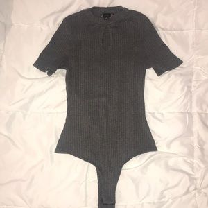 Grey body suit
